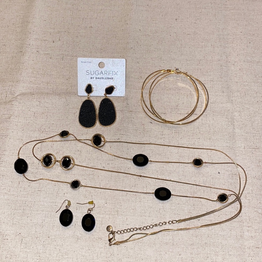 Set of 4 black and gold metal